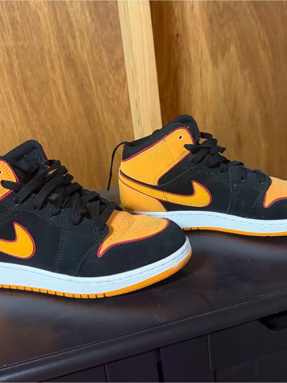 Nike Kids Black and Orange High-Top Sneakers